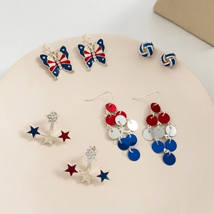 Set of four USA flag themed earrings in red white and blue with rhinestone details