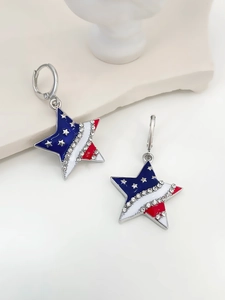 Detailed macro of American flag star earrings with sparkling rhinestones and enamel inlay