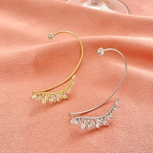 Minimalist leaf-shaped ear cuffs with marquise zircons in gold and silver finish