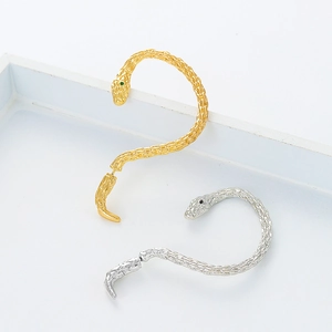 Boucles d'oreilles serpent vintage en or et argent avec des yeux sertis de zircons cubiques