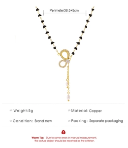 Dettaglio collana di perle con pendente infinito e perle, lunghezza 38,5 più 5 cm
