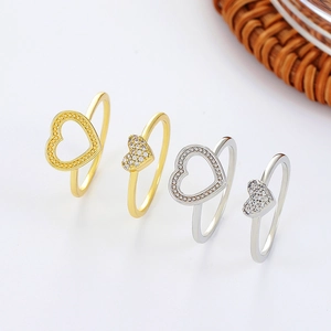 Fashion heart shaped ring set with micro-inlaid cubic zirconia in gold and silver finish