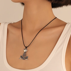 Hip hop creative hollow frog pendant necklace with black cord on model neck