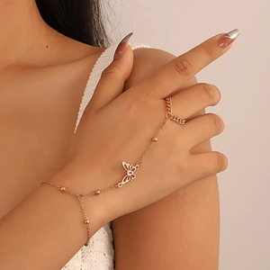 Elegant gold butterfly hand chain ring bracelet featuring delicate butterfly motif