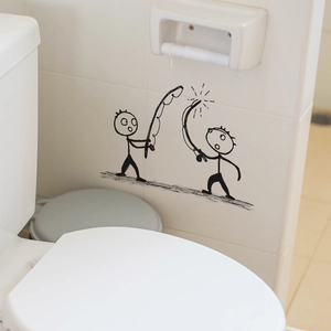 Minimalist black vinyl stickman fishing wall sticker on a white bathroom tile wall