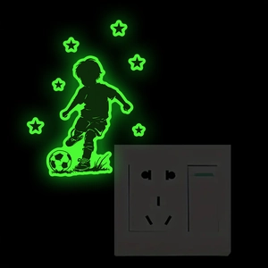 Sticker mural phosphorescent avec silhouette de footballeur et étoiles décoratives