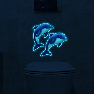 Luminous wall stickers featuring two blue glowing dolphins for home decoration
