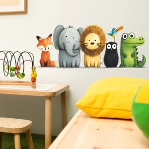 Hand-painted cartoon animal wall stickers featuring a fox, elephant, and lion for nursery decor