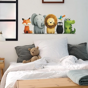 Nursery wall decals featuring cartoon fox, elephant, lion, and owl for kids bedroom decor