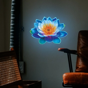 Glow-in-the-dark blue lotus wall sticker shown in a modern living room setting