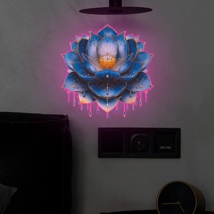 Luminous blue lotus wall art with pink neon backlight shown in a cozy bedroom setting