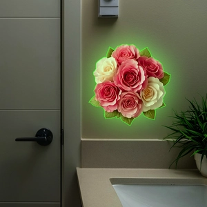 Close-up of luminous rose flower wall decals with glowing edges in a bathroom setting