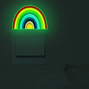 Luminous rainbow wall sticker for bedroom switches with soft green glowing night light effect