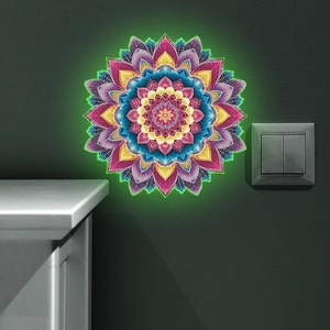 Detail of glow-in-the-dark mandala wall sticker with neon green floral pattern