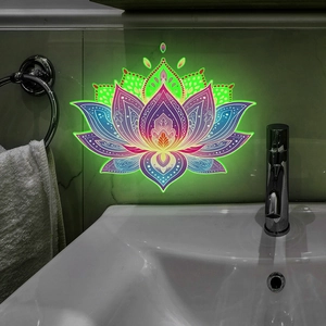 Luminous mandala lotus wall sticker glowing on a dark bathroom wall background