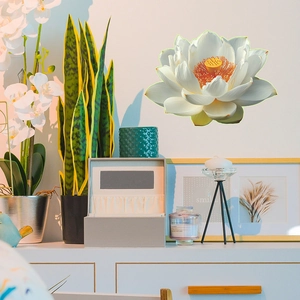Luminous lotus flower wall sticker detail with white petals on a home decor background