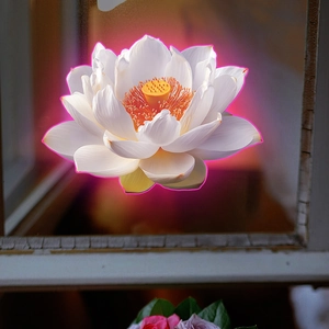 Detailed close-up of a luminous lotus wall sticker with white petals and yellow center