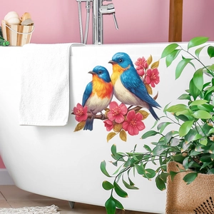 Self-adhesive wall sticker featuring blue birds on cherry blossom branches for bathroom decor