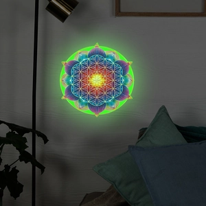 Detail view of glowing Mandala wall sticker with flower of life pattern and LED light effect