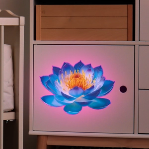 Glow-in-the-dark blue lotus wall sticker applied on white minimalist cabinet door detail