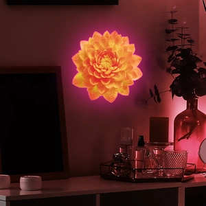 Luminous blooming flower wall lamp with yellow to orange gradient petals and neon glow