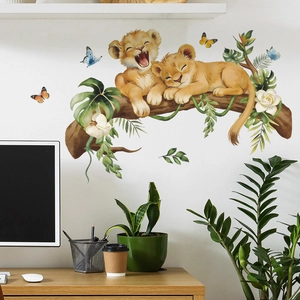 Cartoon baby lion cubs on tree branch wall stickers for a colorful nursery room decoration