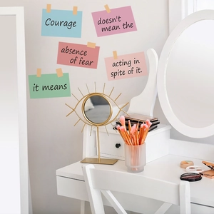Artistic golden sunburst vanity mirror with a metal frame for chic desktop decor