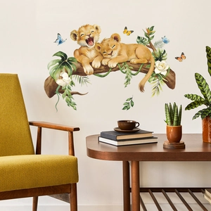 Cartoon lion cubs on tree branch wall sticker with tropical leaves and butterflies