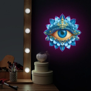 Detail of blue lotus eye wall sticker with gold patterns and purple backlight effects