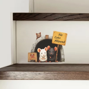 Detail showing cartoon mouse hole wall sticker with No Cats Allowed sign on wall