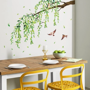 Nature wall sticker featuring green willow branches and colorful birds for home decoration
