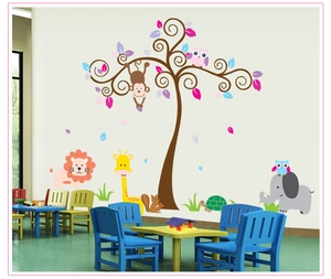 Cartoon animal wall decal set with owl, monkey, and tree for nursery room decor