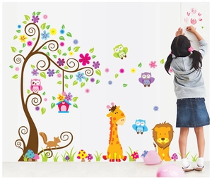 Detail of cartoon animal wall stickers with giraffe, lion and tree for kids' room decoration