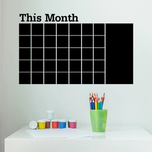 Close-up of minimalist black monthly calendar wall sticker with 'This Month' header detail