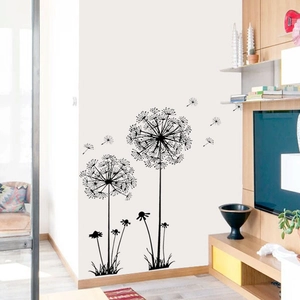 Close-up of black dandelion wall decal seeds blowing in a modern minimalist living room