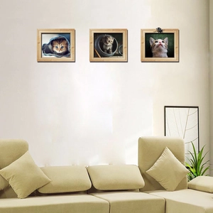 Three-piece modern cat wall art set with light wood frames for home decor