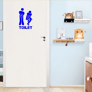 Cute cat wall hooks and blue toilet door sticker in a modern bathroom interior scene