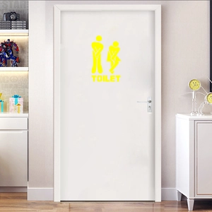 Funny yellow toilet door sticker showing creative man and woman icons on a white door surface