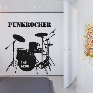 Macro detail of Punkrocker drum set wall decal applied on a modern studio background wall