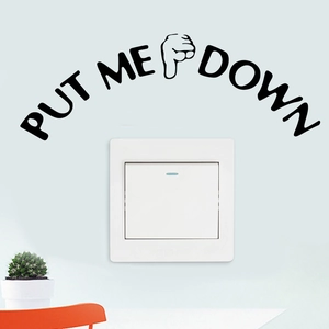 Adesivo da parete minimalista 'PUT ME DOWN' con icona del gesto della mano per toilette o interruttore