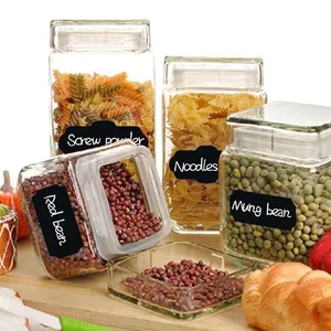 Set of glass food storage jars with wooden lids and black self-adhesive PVC labels