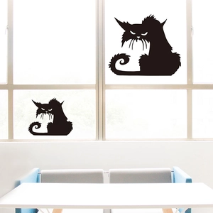 Detail of spooky black cat silhouette glass stickers for Halloween window decor