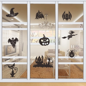 Halloween vinyl window stickers featuring spooky bats, ghosts, and pumpkins for home decor