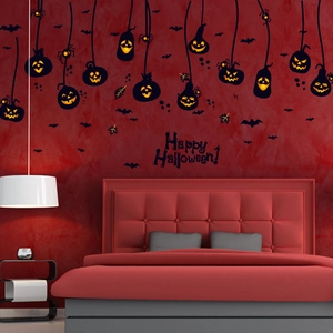 Detail of Halloween pumpkin and bat wall stickers on a modern bedroom wall surface