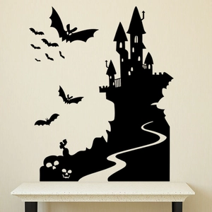 Detail of Gothic castle and flying bats Halloween vinyl wall decal on textured wall