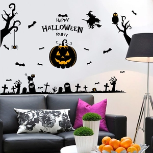 Detail of Halloween wall stickers featuring black pumpkins, bats, and cemetery silhouettes