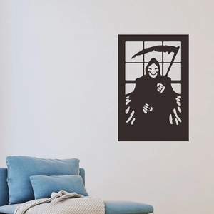 Macro detail of a black gothic grim reaper silhouette wall sticker for Halloween decor