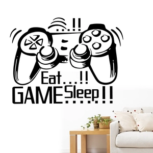 Detail of gamer wall decal featuring controller icon and Eat Sleep Game text on white wall