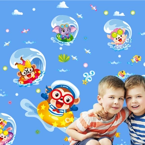 Detail of cartoon monkeys and animals surfing on light blue children's room wall stickers