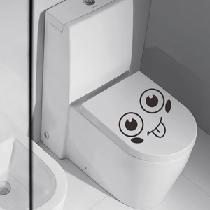 Cute black smiley face toilet lid sticker with eyes and tongue out for bathroom decor